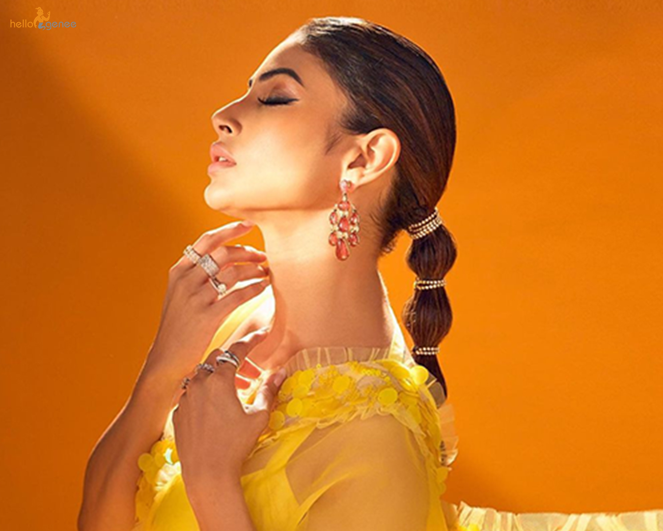 Mouni Gets PLAYFUL in White - Rediff.com